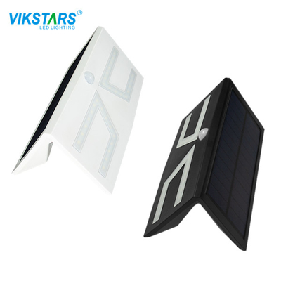 Τοίχος ελαφρύ 4pcs RGB IP65 6000K των ΣΥΝΕΧΩΝ 3.2V ηλιακών τροφοδοτημένος οδηγήσεων προαυλίων